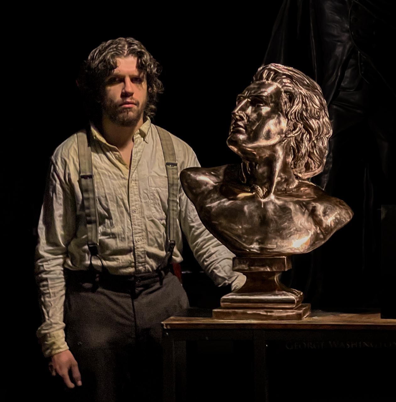 Prometheus Bust shown to scale beside a person