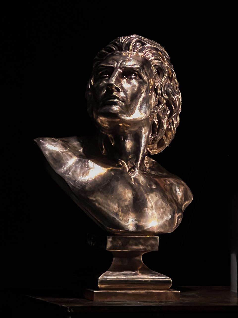 Bronze bust of Prometheus on a plinth