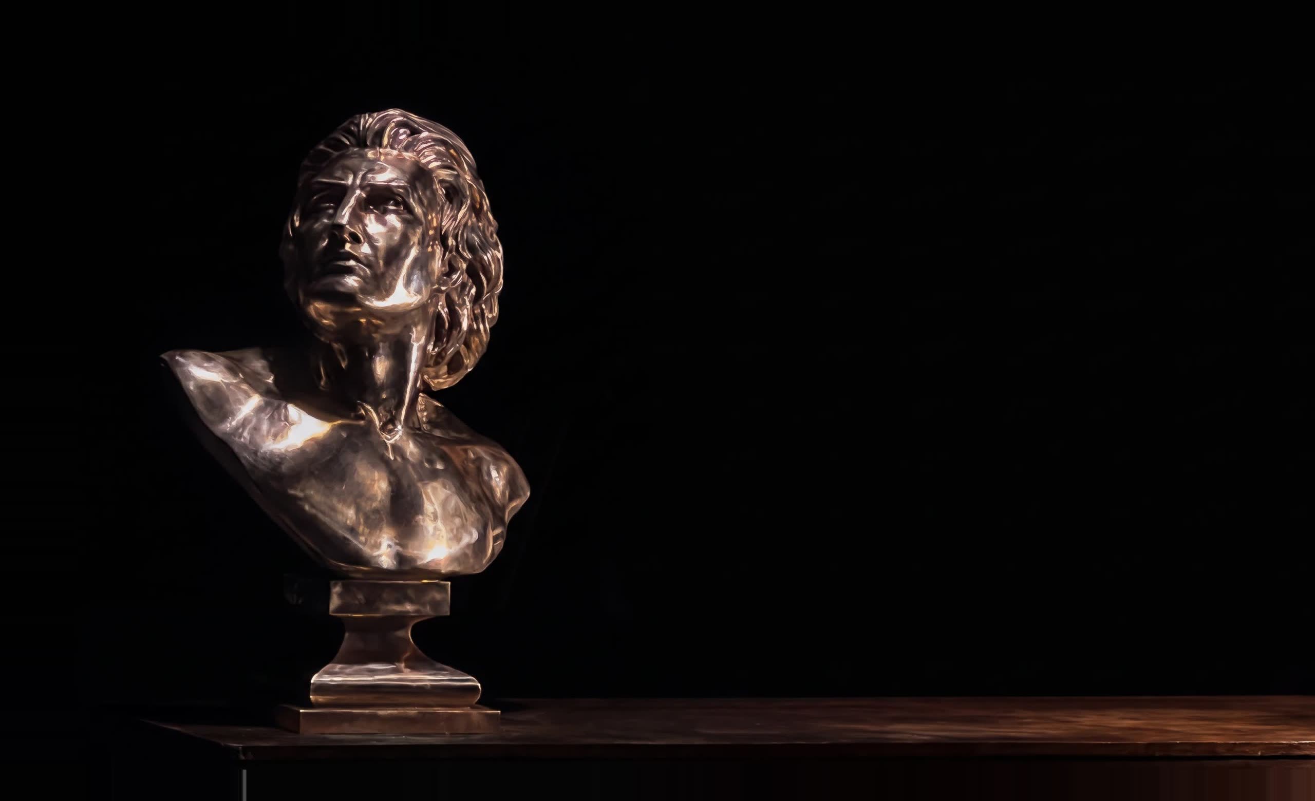 Bronze bust of Prometheus on a plinth